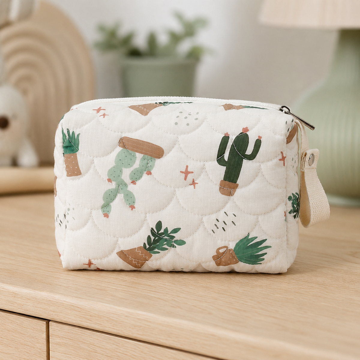 Pochette imperméable bébé motif cactus en tissu matelassé