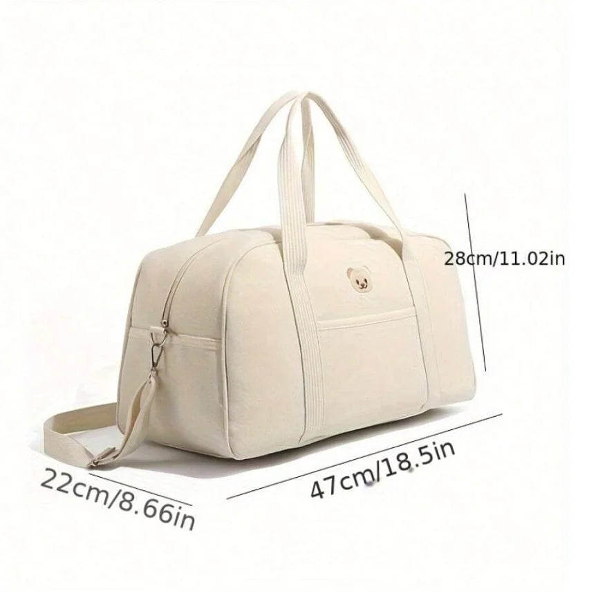 Dimensions du sac à langer grand format : 47 × 22 × 28 cm