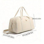 Dimensions du sac à langer grand format : 47 × 22 × 28 cm