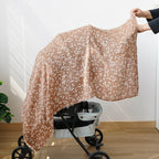 Lange bébé fleuri utilisé en promenade sous surveillance sans obstruer la ventilation
