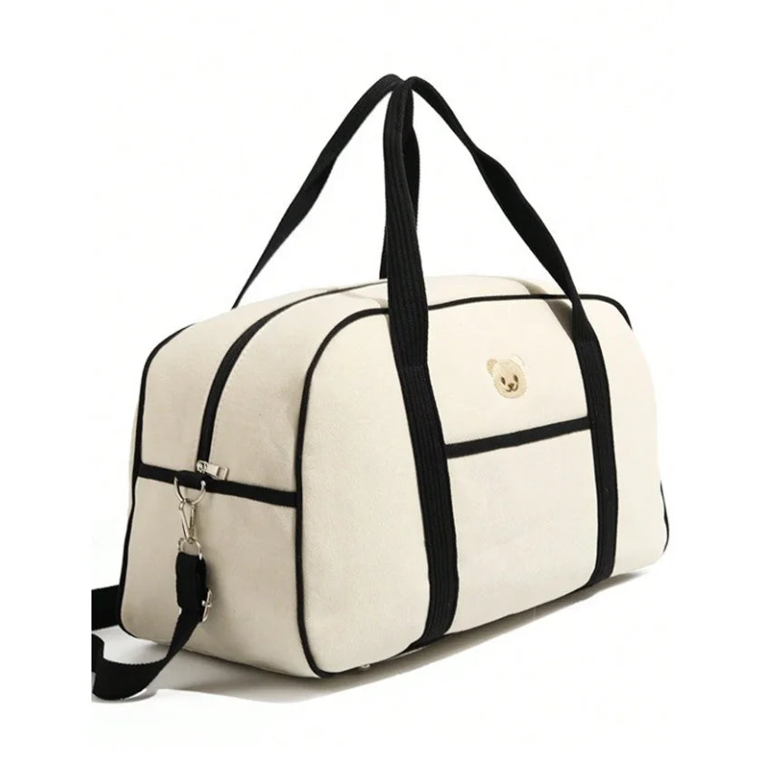 Sac à langer écru et noir 47 cm avec anses et bandoulière
