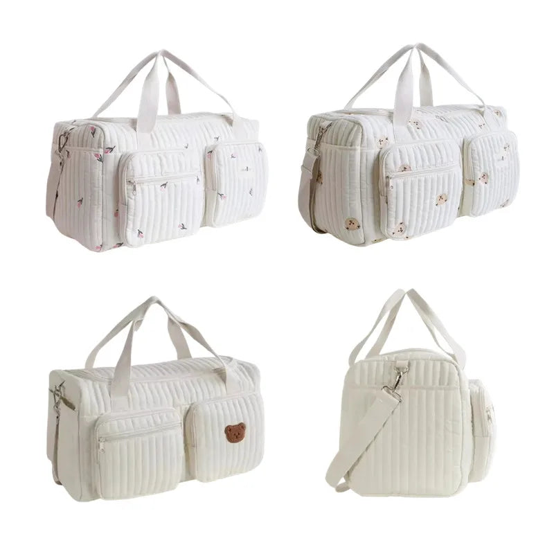 Sac à langer matelassé écru en quatre modèles ours et fleurs