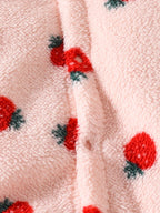 Détail de la fermeture à boutons de la combinaison bébé